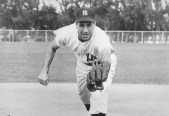 Phil Rizzuto, here in a posed shot, scored on DiMaggio's single. 
